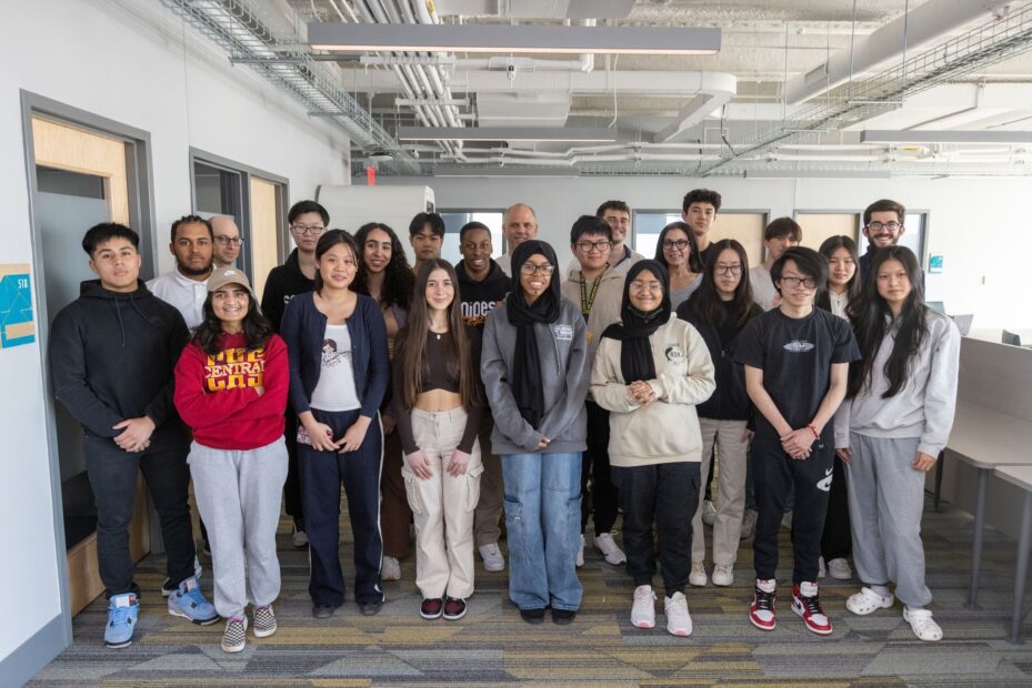 Students pose with David Musto for a group picture