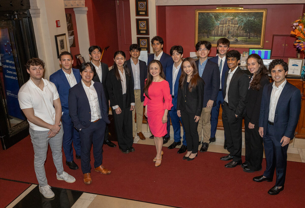 The full Cypher Accelerator team poses for a group photo in the Penn Club of New York.